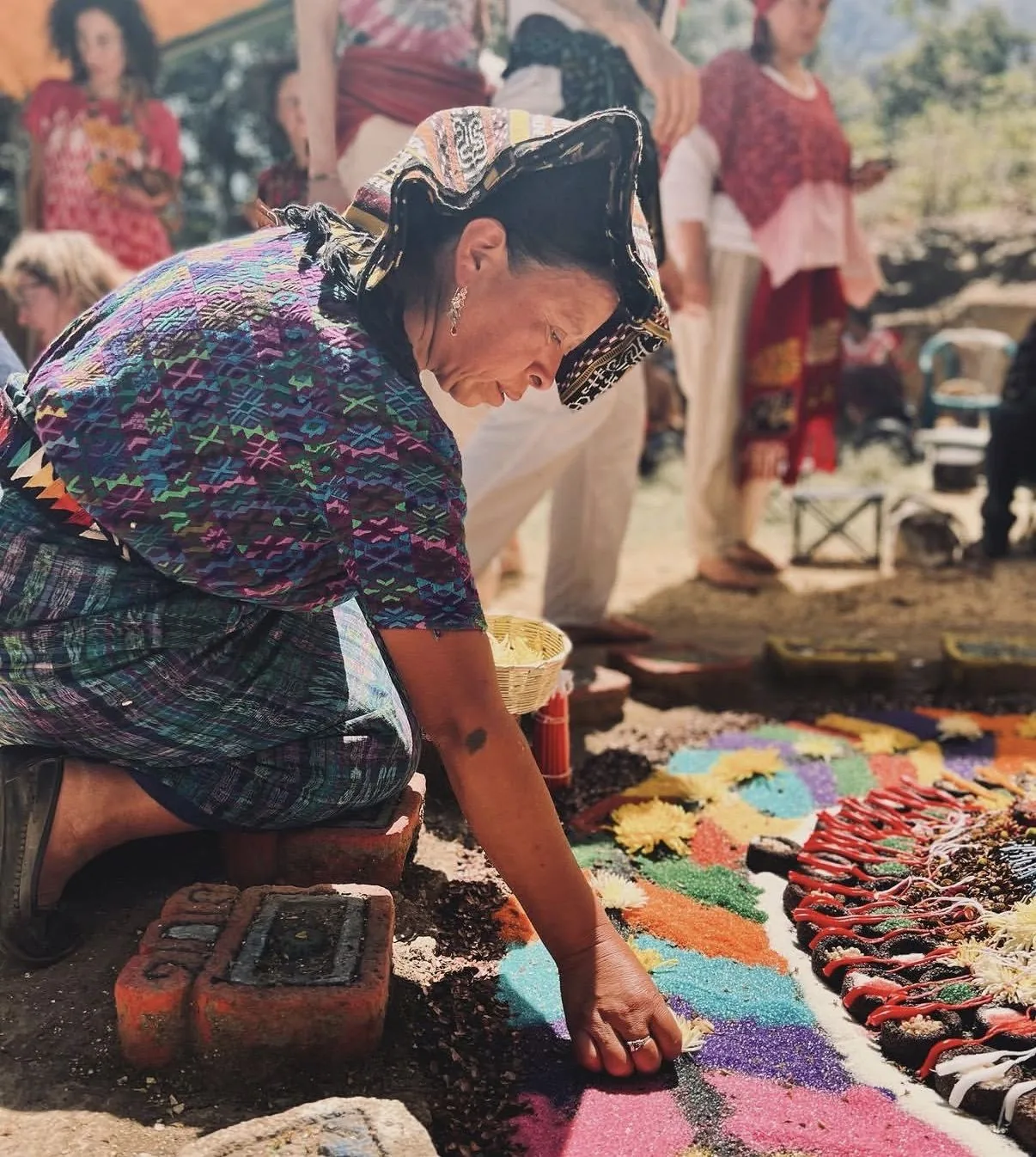 Handmade ceremonial textiles and offerings laid out in Guatemala